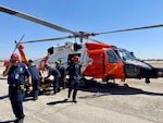 A Coast Guard Air Station San Diego MH-60 Jayhawk helicopter aircrew rescues a 53-year-old man approximately 3 miles south of Seal Beach Pier, California, Aug. 17, 2026. The man was located after a more than 12-hour multiagency search and transported to Long Beach Airport, where he was transferred to emergency medical personnel for treatment.