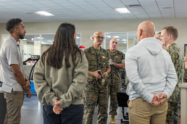 U.S. Navy Rear Adm. Guido Valdez, medical officer of the Marine Corps, interacts with Sailors and staff during a visit to Naval Branch Health Clinic Marine Corps Recruit Depot San Diego, Aug. 14. NBHC MCRDSD is a branch of Naval Medical Center San Diego. NMCSD employs more than 5,500 active-duty military personnel, civilians, and contractors in southern California to deliver exceptional care afloat and ashore. (U.S. Marine Corps photo by Lance Cpl. Janell B. Valerio Alvarez)