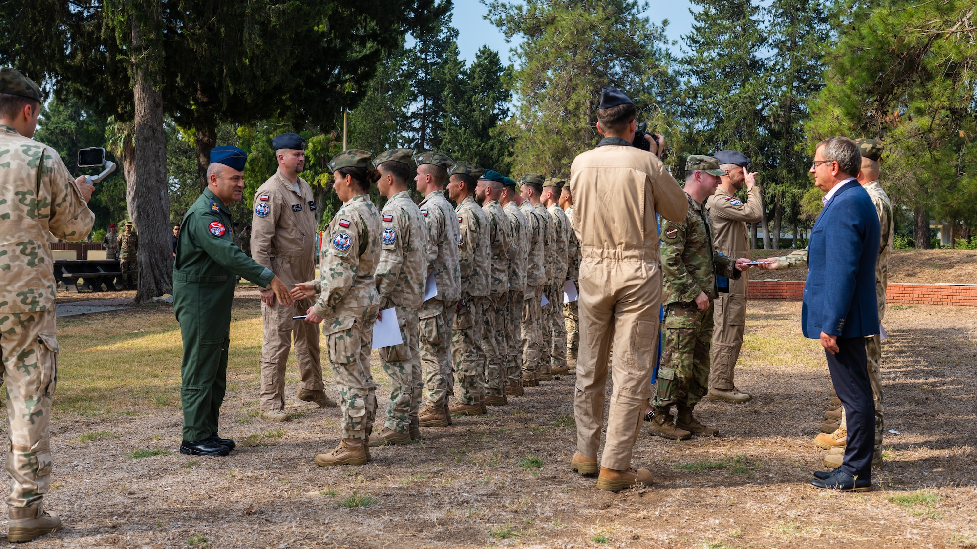 Members assigned to the Polish Military Contingent receive recognition from Turkish air force Brig. Gen. Kemel Güleç, 10th Main Jet Base Command commander, and U.S. Air Force Col. Isaac Adams, 39th Air Base Wing commander.