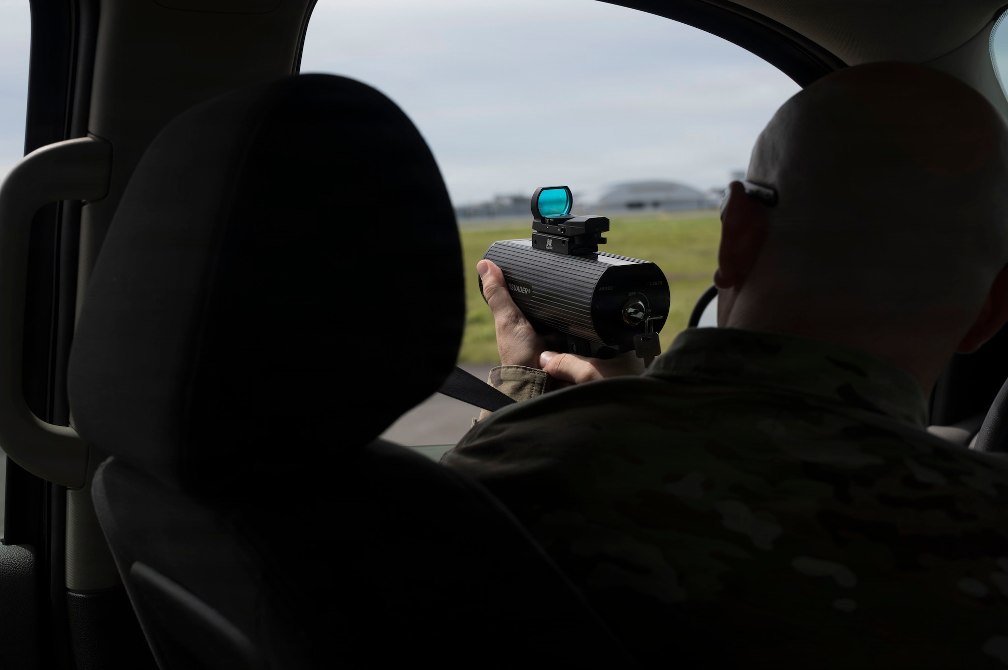 U.S. Air Force Tech. Sgt. Christopher Frank, 35th Fighter Wing aviation safety noncommissioned officer, demonstrates an Avian Dissuader while conducting a Bird/Wildlife Aircraft Strike Hazard Program familiarization during a Wild Weasel Walkthrough at Misawa Air Base, Japan, Aug. 18, 2026.