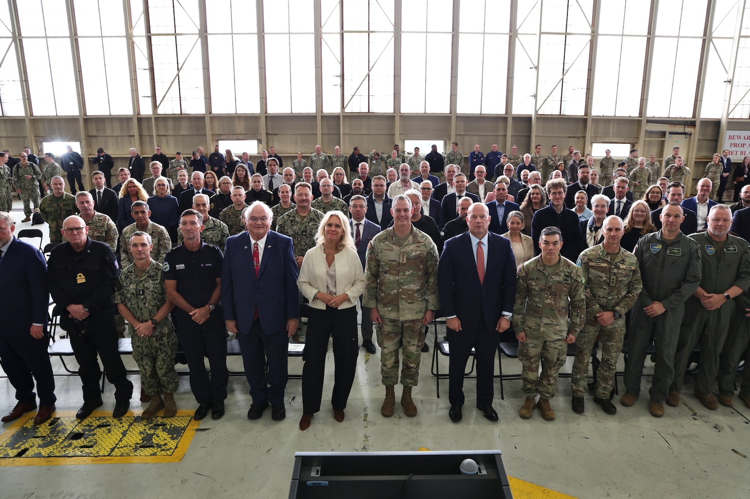 Þorgerður Katrín Gunnarsdóttir, Minister for Foreign Affairs of Iceland, center left, U.S. Air Force Gen. Alexus G. Grynkewich, NATO Supreme Allied Commander Europe, commander of U.S European Command, center right, and distinguished guest pose for a group photo during the opening ceremony of exercise Northern Viking 26 (NV26) at Keflavik Air Base, Iceland, Aug. 18, 2026.