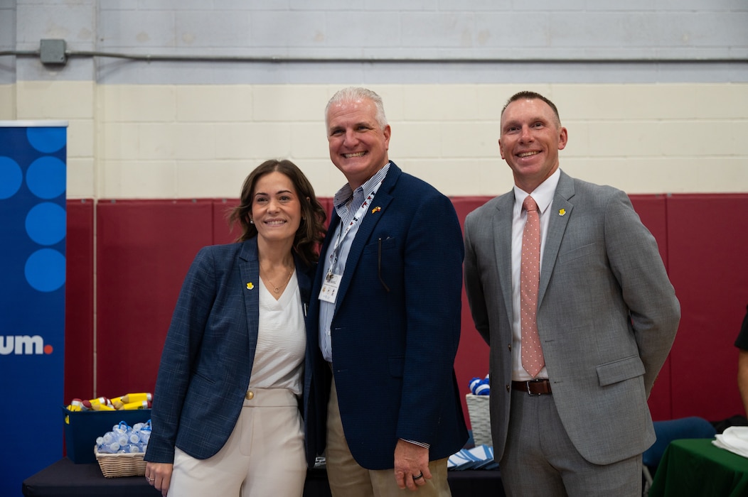 Tiffany Sheppard (left), 17th Training Wing honorary commander, poses with U.S. Air Force Col. Matthew Norton, 17th Training Wing commander, and Chief Master Sgt. Derek Neill, 17th TRW command chief, for a picture at the Back to School Brigade, Goodfellow Air Force Base, Texas, Aug. 6, 2026.