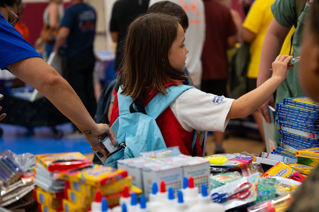 Military families receive free school supplies during the annual Back to School Brigade, Goodfellow Air Force Base, Texas, Aug. 6, 2026.