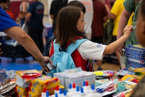 Military families receive free school supplies during the annual Back to School Brigade, Goodfellow Air Force Base, Texas, Aug. 6, 2026.