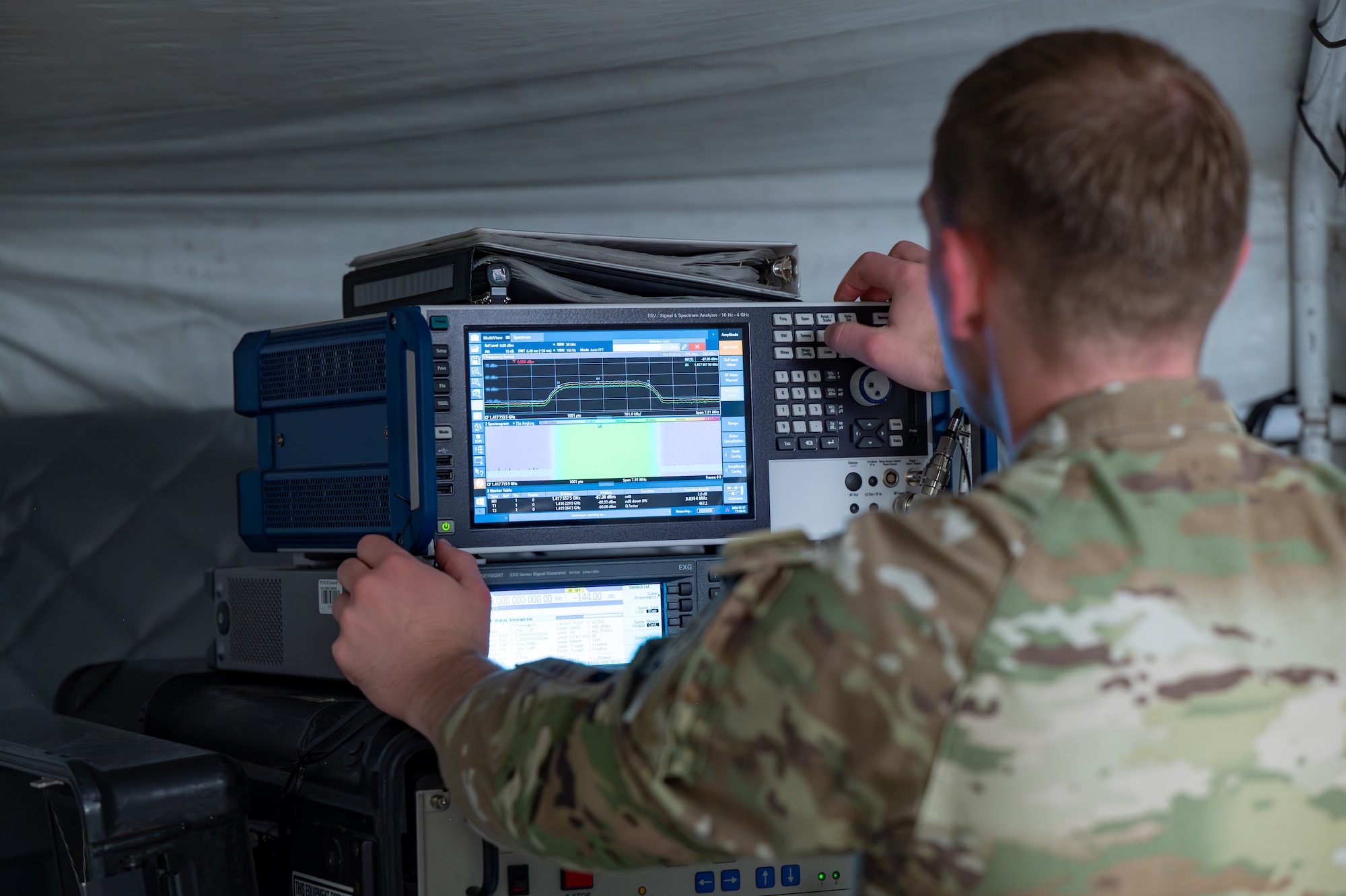 Mission Delta 3 Guardians sharpen their tactical edge on the Ground Multi-band Terminal (GMT) and Quad-band Large Aperture Antenna (QLAA) at Peterson Space Force Base, Colorado, July 27, 2026. These highly deployable systems provide the critical, multi-band SATCOM links that power joint operations worldwide. By running live electronic warfare scenarios on the GMT and QLAA, Guardians train to detect, identify, and defeat simulated adversary jamming in real-time. This realistic, contested-environment training ensures operators are combat-ready, without disrupting real-world communications. (U.S. Space Force photo by Dave Grim)