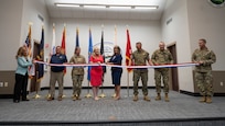 Pictured left to right: Nancy Maloy, NSWC Crane Platform Protection & Countermeasures Technologies Division Manager, Marty Terry, NSWC Crane Countermeasures Assessment Branch Manager, Brigadier General Cathy Eaken, Congresswoman Erin Houchin, Dr. Angela Lewis (SES), Technical Director, NSWC Crane, COL Russell “Bubba” Strange, COL Daniel Bell, and Command Sgt Maj. Brad Simmons at the ribbon cutting for the nation’s first ground-based Sled Track Facility at Camp Atterbury in Indiana.