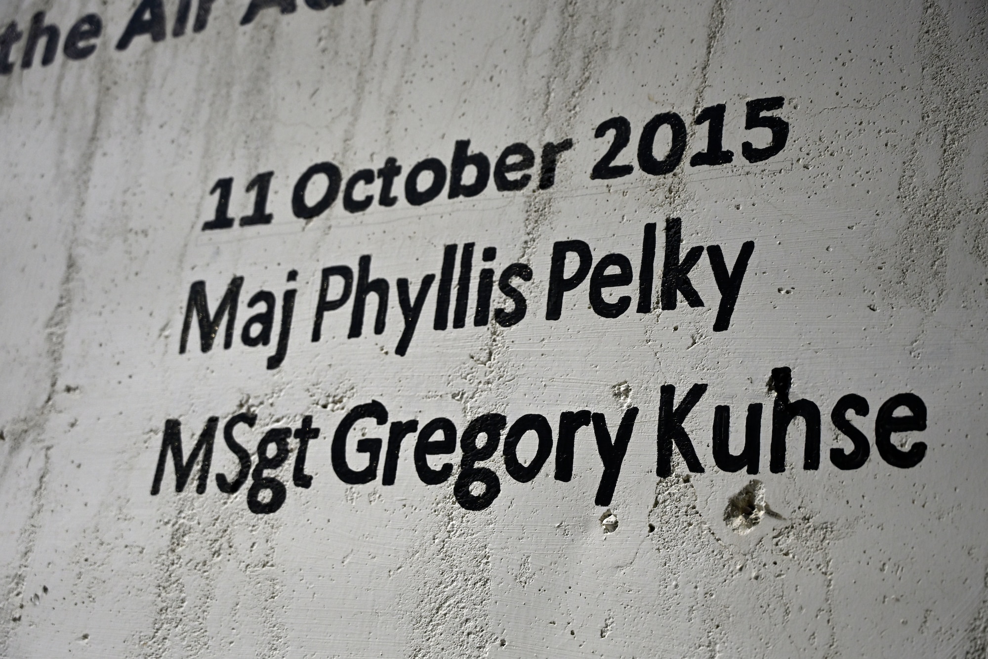 This wall memorializes eleven US personnel who died in Afghanistan helping to build an Afghan Air Force.