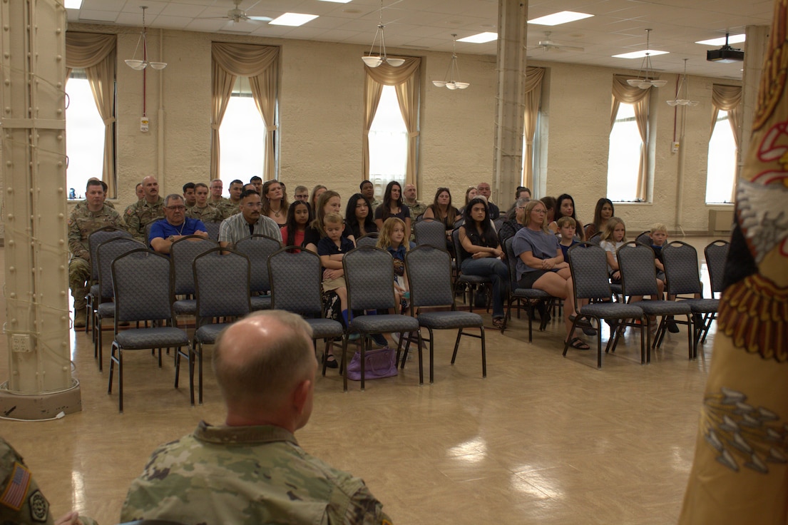 Family, friends and Soldiers of the 6th Battalion, 54th Security Force Assistance Brigade, Illinois Army National Guard, sit and listen to the welcome home ceremony