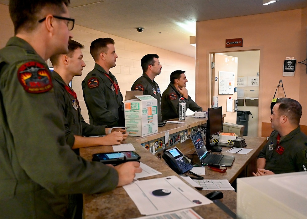 U.S. Air Force F-35A Lightning II pilots assigned to the 13th Fighter Squadron at Misawa Air Base, Japan, attend a pre-flight briefing during RED FLAG-Alaska 26-3 at Eielson Air Force Base, Alaska, Aug. 18, 2026.