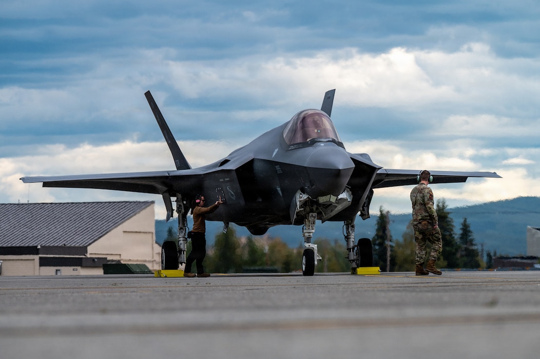 U.S. Airmen assigned to the 13th Fighter Squadron at Misawa Air Base, Japan, prepare an F-35A Lightning II before takeoff during RED FLAG-Alaska 26-3 at Eielson Air Force Base, Alaska, Aug. 17, 2026.