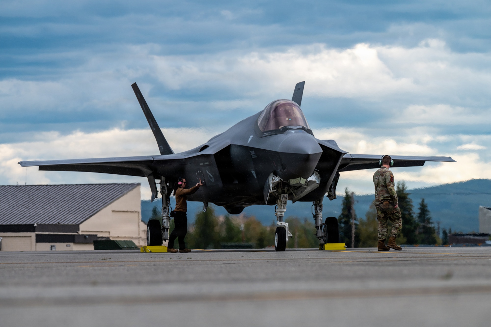 U.S. Airmen assigned to the 13th Fighter Squadron at Misawa Air Base, Japan, prepare an F-35A Lightning II before takeoff during RED FLAG-Alaska 26-3 at Eielson Air Force Base, Alaska, Aug. 17, 2026.