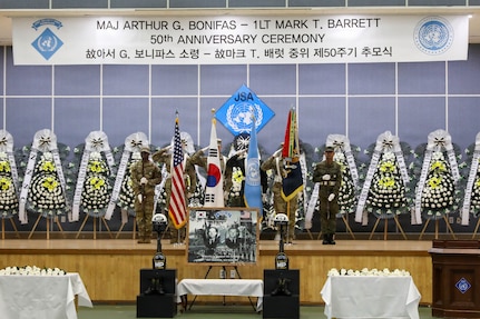 The United Nations Command Honor Guard presents the colors and salutes during the 50th commemoration ceremony at Camp Bonifas on Aug. 18, 2026, honoring Maj. Arthur G. Bonifas and 1st Lt. Mark T. Barrett, who were killed in the 1976 “axe murder incident” in the Korean Demilitarized Zone.
