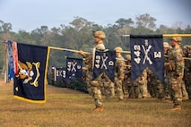 U.S. Army Reserve unit, 100th Battalion, 442nd Regimental Combat Team, present their guidon during the opening ceremony of Exercise Ksatria Warrior at Baturaja Combat Training Center, Indonesia, Aug. 15, 2026