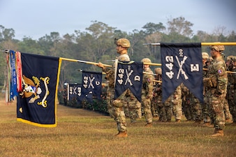 U.S. Army Reserve unit, 100th Battalion, 442nd Regimental Combat Team, present their guidon during the opening ceremony of Exercise Ksatria Warrior at Baturaja Combat Training Center, Indonesia, Aug. 15, 2026