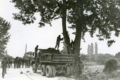 U.S. and South Korean military forces conduct Operation Paul Bunyan at the joint security area in the Korean Demilitarized Zone, Aug. 21, 1976. The combined forces executed the mission to cut down a tree in the security area following an attack by North Korean guards that killed two U.S. soldiers three days earlier.