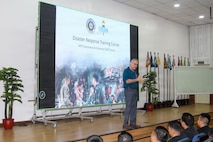 Mike Wylie, Disaster Management and Humanitarian Assistance Advisor for the U.S. Pacific Command’s Center for Excellence in Disaster Management and Humanitarian Assistance (CFE-DM), provides opening remarks for a CFE-DM-led Disaster Response training course to 204 students of Class 77, Command and General Staff College, Armed Forces of the Philippines, at Camp Aguinaldo, Philippines 4 August.