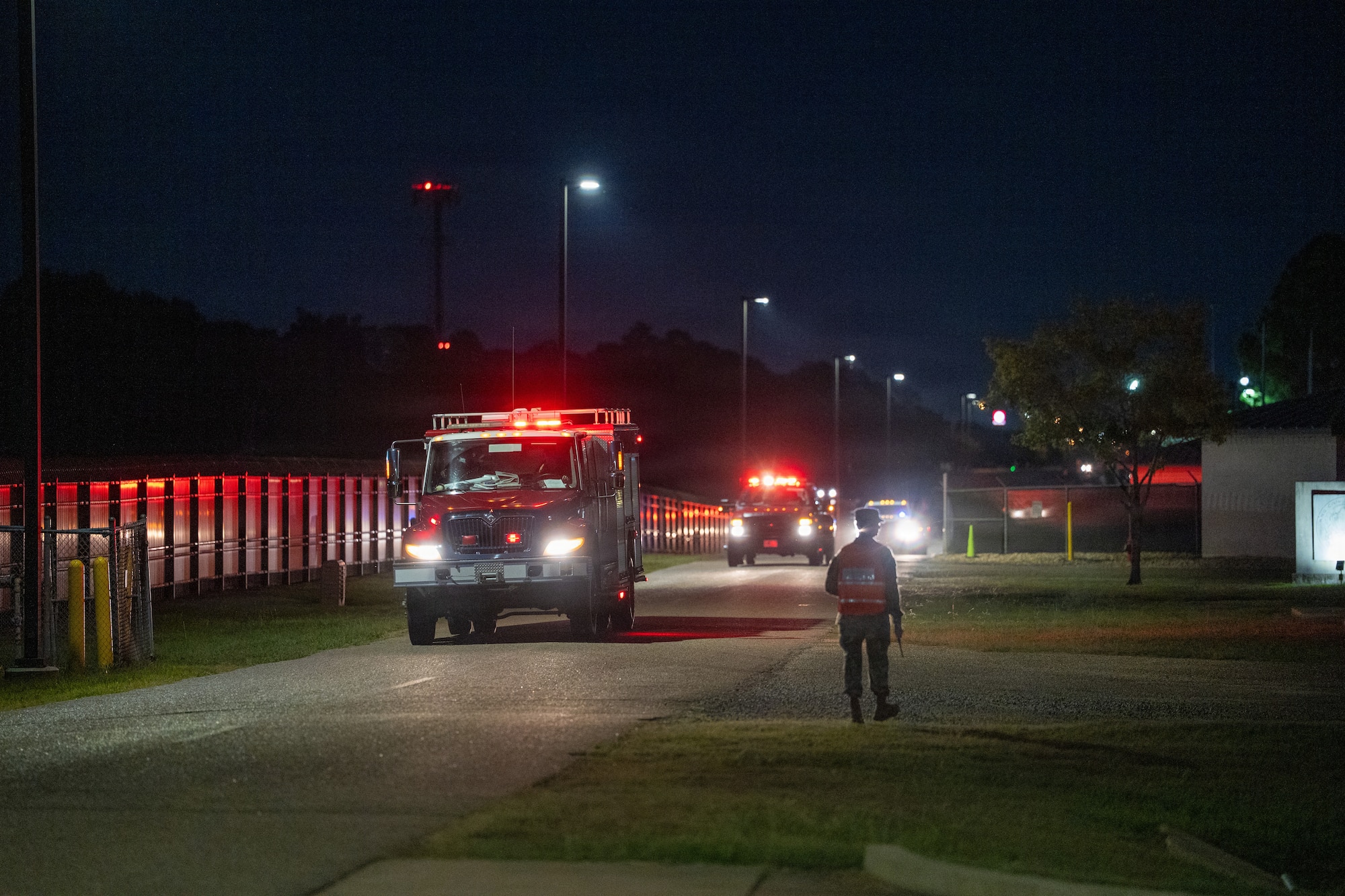 Emergency response vehicles arrive following a simulated attack.