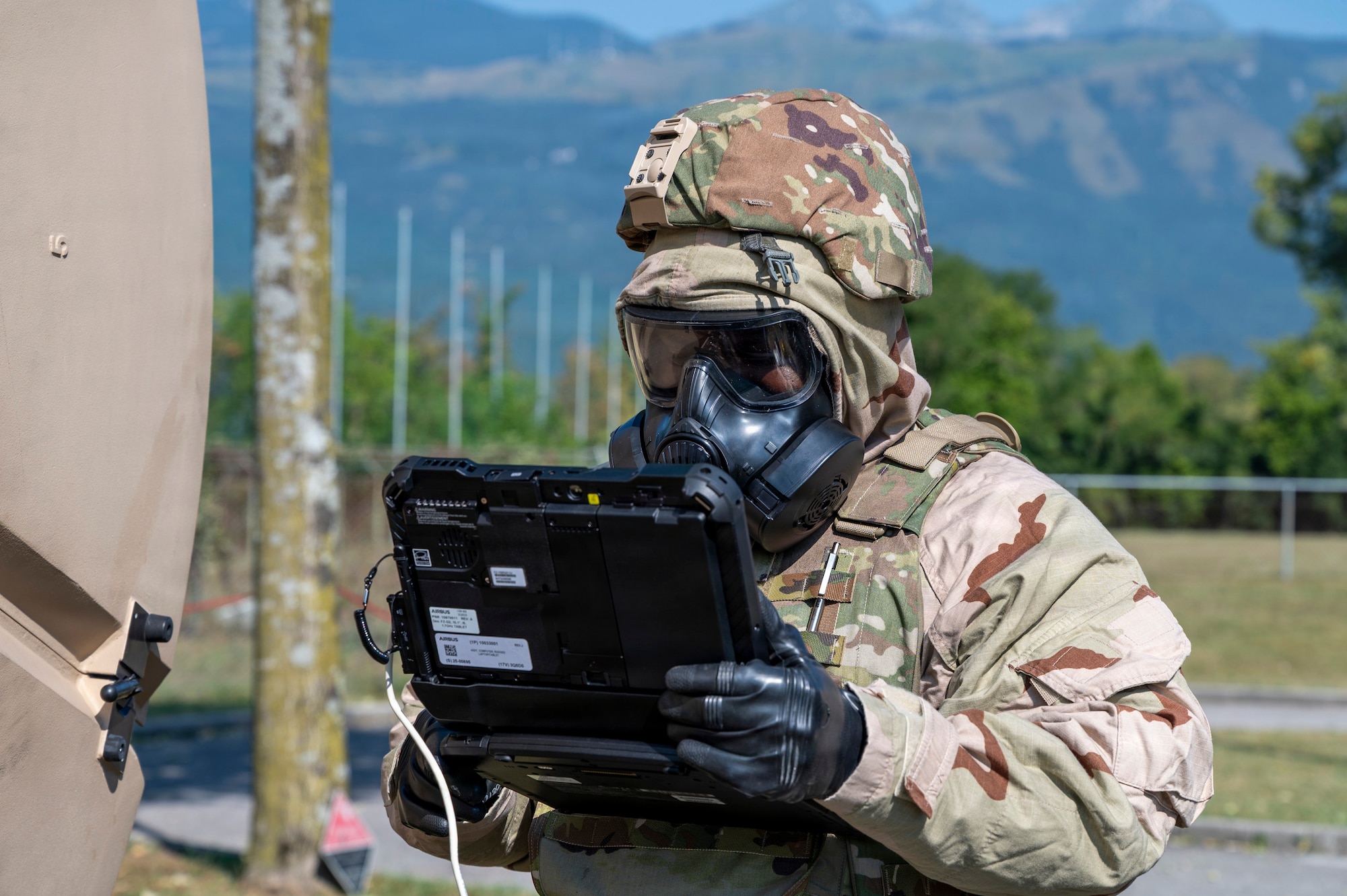 A man checks satellite connections on a computer.
