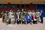 U.S. and Botswana military personnel pose for a photo following the closing ceremony for Exercise Southern Accord 2026 at Gaborone Technical College in Gaborone, Botswana, Aug. 15. The biennial exercise, held Aug. 10-15, supports U.S. Africa Command’s objectives of empowering willing and able African partners to lead efforts to degrade and disrupt illicit activities and malign actors in the region. Photo by Staff Sgt. Reanna Hartgrove.