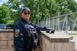 Ruben Rodriguez, officer in charge at the 171st Air Refueling Wing entry control point, poses for a portrait at his post, June 16, 2026, near Pittsburgh, Pennsylvania. Rodriguez served 30 years in the armed forces and retired as a command sergeant major from the New Jersey Army National Guard in 2017. (U.S. Air National Guard photo by Airman 1st Class Natalie Claypoole)