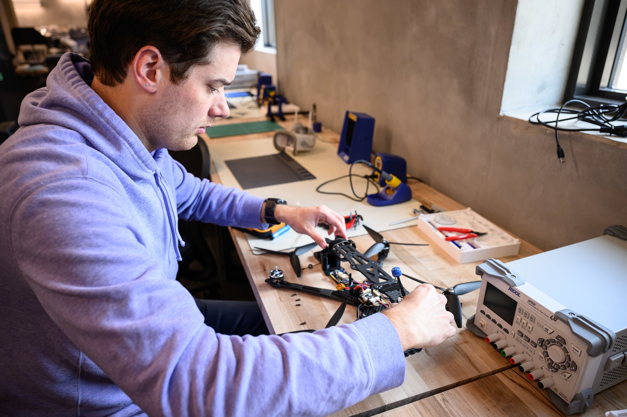 Jonathan Gates, 309th Software Engineering Group, assembles a drone a Hill Air Force Base, Utah, June 20, 2026. Operating out of the 309th Engineering Group's "Launch Pad," the Black Knights team delivers custom, Blue-listed drones for the cost of components and parts. The team also assists with flight training and certification for its customers. (U.S. Air Force photo by R. Nial Bradshaw)