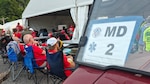 Military and civilian organizations are working together to support Scouting America’s 2026 National Jamboree at the Summit Bechtel Reserve in West Virginia. The partnership includes the West Virginia Army and Air National Guard, Connecticut Army and Air National Guard, U.S. Army, U.S. Navy, West Virginia Emergency Management Division, West Virginia State Police, and numerous local, state and federal agencies.
Through coordinated planning, communications, logistics, medical support, public safety, emergency management and other mission capabilities, participating organizations are helping provide a safe, secure and successful event for Scouts, volunteers and visitors. This whole-of-government and community partnership demonstrates the value of interagency cooperation while supporting youth development, public service and national preparedness. (U.S. Army National Guard photo by Staff Sgt. Zoe Morris)