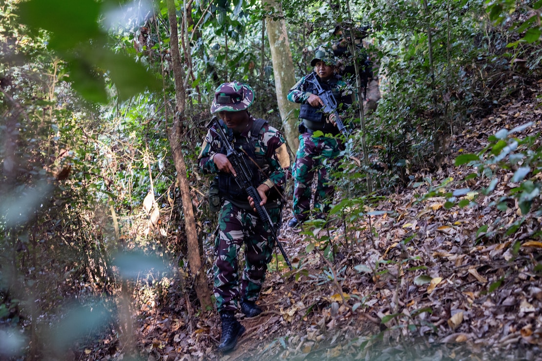 Indonesian marines with 7th Infantry Battalion, 4th Brigade, patrol during a point man course as part of a platoon exchange near Lampung, Indonesia, Aug. 18, 2026.