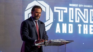 Man speaking at podium