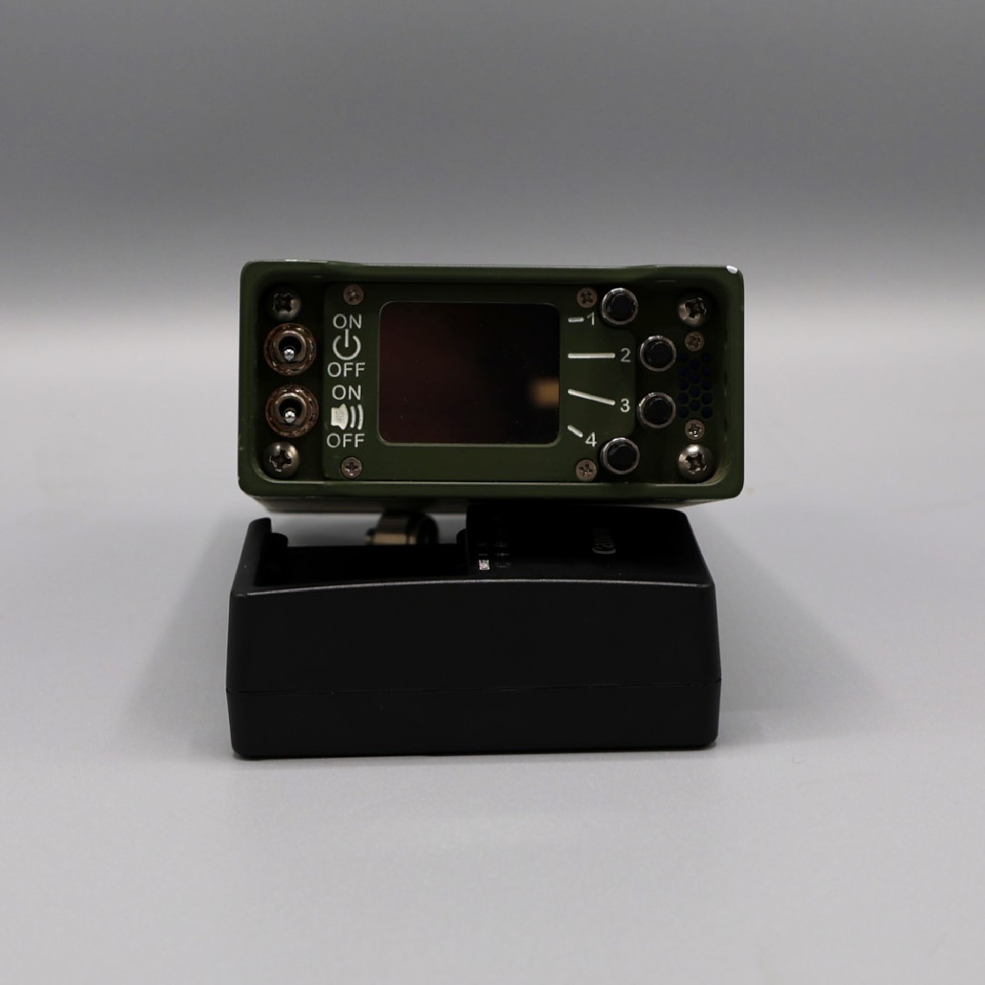 A Vehicle Integrated Platform Enhanced RADIAC sits on a grey background.