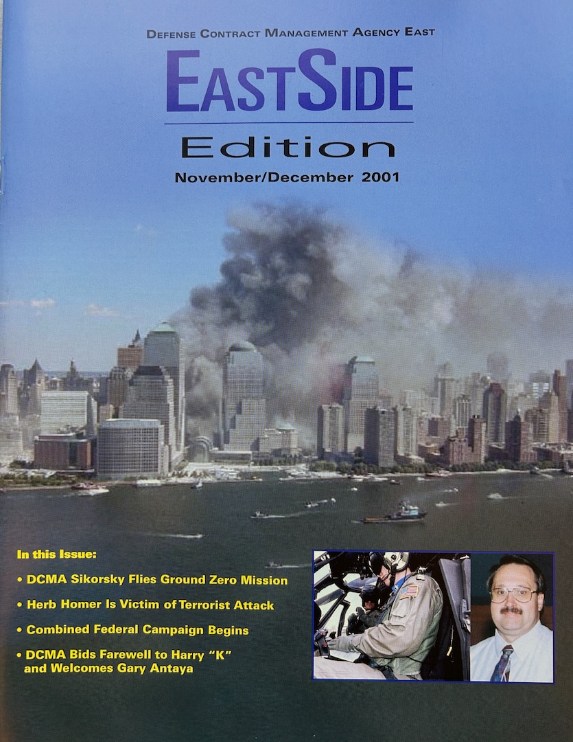 Magazine cover showing New York City with smoke from the terrorist attacks.
