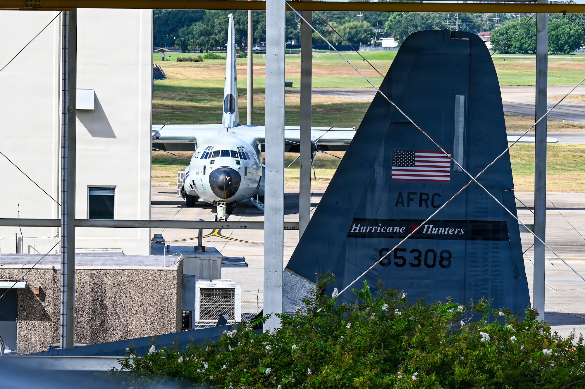 Two WC-130J Super Hercules aircraft sit ready for the next mission