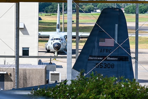Two WC-130J Super Hercules aircraft sit ready for the next mission