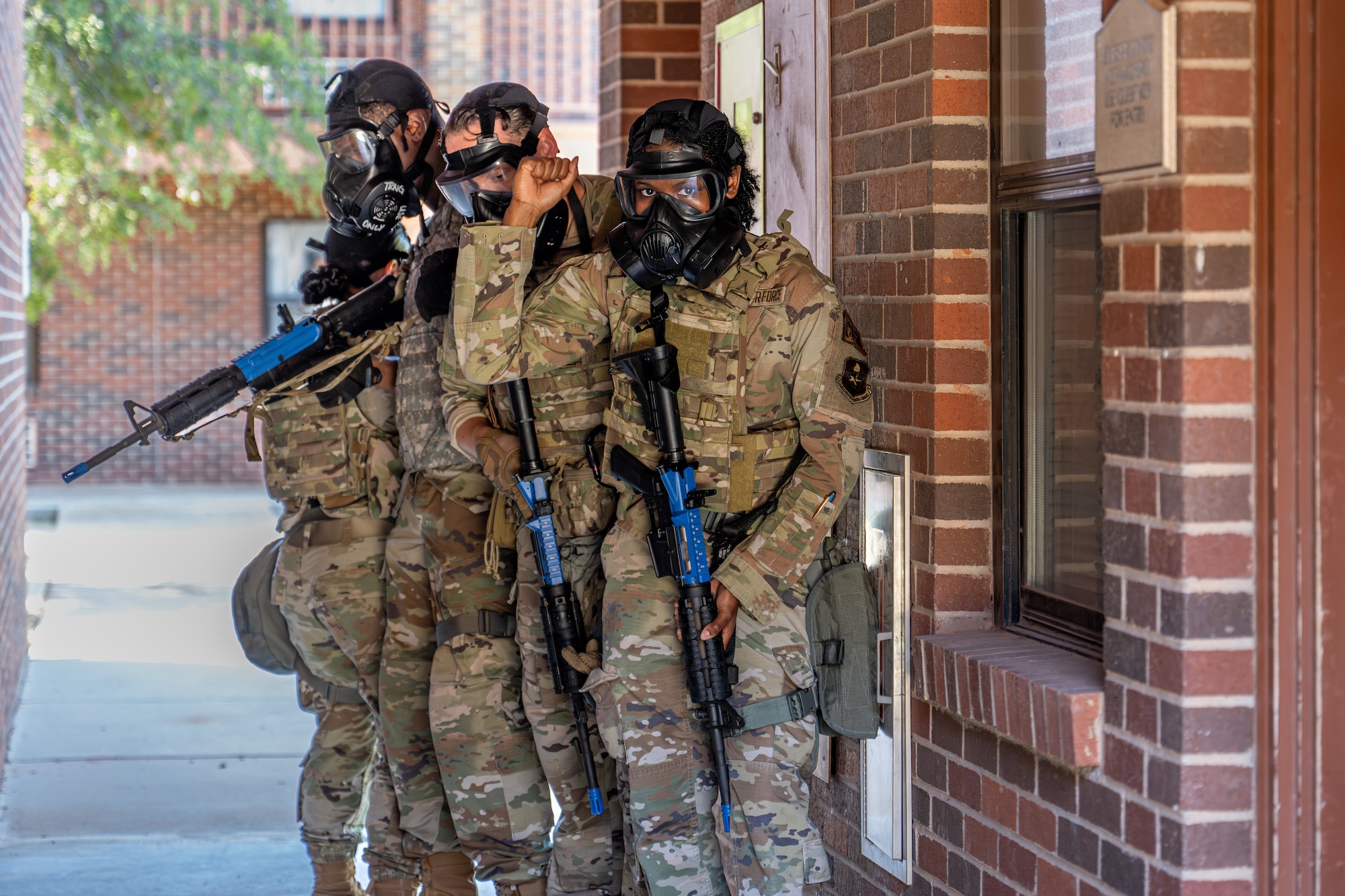 U.S. Airmen prepare to enter a room during the Southwest Showdown training event at Dyess Air Force Base, Aug. 12, 2026. The event, hosted by the 7th Civil Engineer Squadron, brought together emergency management flights from five Air Force installations and included U.S. Air Force Civil Engineer Center observation throughout the week. (U.S. Air Force photo by Airman 1st Class Caleb Schellenberg)