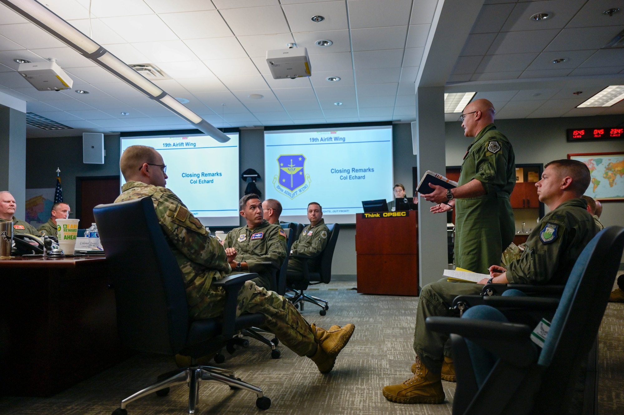Men talk at a meeting