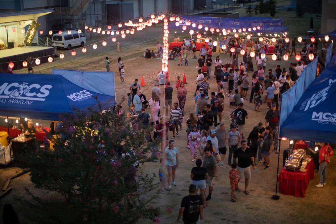Guests attend a Bon Odori summer festival at Marine Corps Air Station Iwakuni, Japan, Aug. 15, 2026. MCAS Iwakuni community members gathered to celebrate a traditional Bon Odori festival including performances, dancing, games, stories and a Japanese-style haunted house. (U.S. Marine Corps photo by Cpl. Colin Thibault)