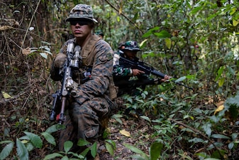 U.S. Marine Corps Cpl. Trent Ai, a team leader with Alpha Company, 1st Battalion, 5th Marine Regiment, Marine Rotational Force – Darwin 26, provides security during a point man course as part of a platoon exchange near Lampung, Indonesia, Aug. 18, 2026.