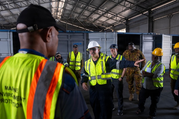 U.S. Coast Guard Chief Warrant Officer 3 Shaun Corrigan introduces areas of training to participants during a walkthrough at the Port of Lae, Aug. 10, 2026, Lae, Morobe Province, Papua New Guinea.