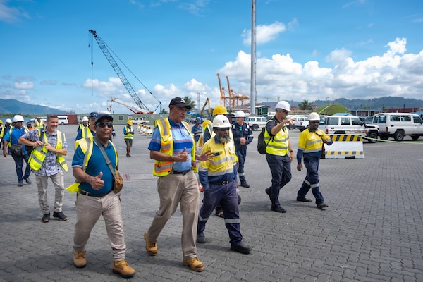 Members of the Papua New Guinea (PNG) National Disaster Centre, PNG Port of Lae, provincial disaster offices, U.S. and international disaster response organizations, government agencies, nongovernmental organizations and international organizations familiarize participants on areas of training during a walkthrough at the Port of Lae, Aug. 10, 2026, Lae, Morobe Province, Papua New Guinea.