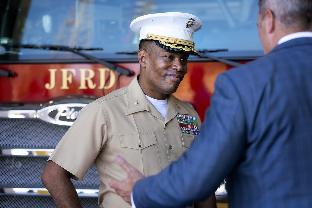 U.S. Marine Corps Col. David Merles, commanding officer of Marine Corps Support Facility Blount Island, discusses Fire Station 48 Aug. 19, 2026, following the station’s opening ceremony on Blount Island in Jacksonville, Florida. The new station, located immediately outside the installation’s main gate, improves emergency response for the Marine facility, port operations and nearby communities. (U.S. Marine Corps photo by Dustin Senger)