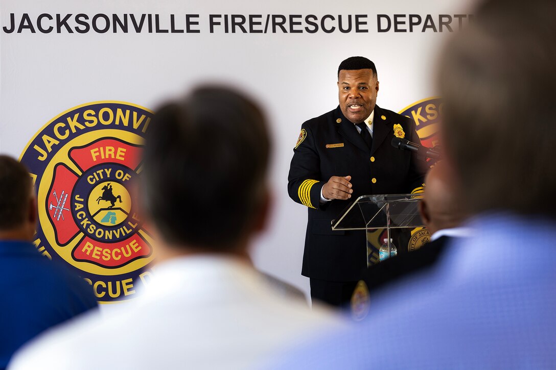 Fire Chief Percy Golden II, director of the Jacksonville Fire and Rescue Department, delivers remarks Aug. 19, 2026, during the Fire Station 48 opening ceremony on Blount Island in Jacksonville, Florida. The new station’s location outside the Jacksonville Port Authority’s secured perimeter improves emergency response to Marine Corps Support Facility Blount Island, port operations and nearby communities. (U.S. Marine Corps photo by Dustin Senger)