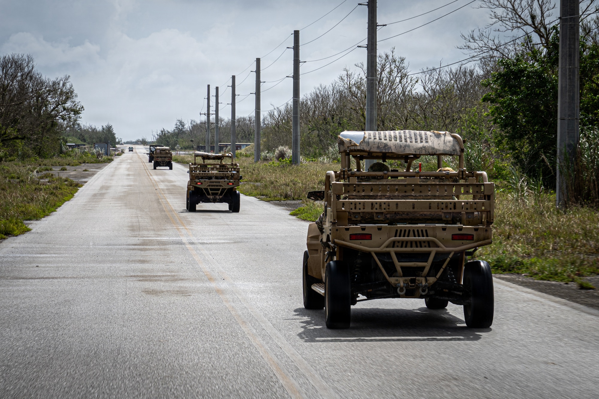 U.S. Air Force security forces Airmen drive MRZRs during Pacific Defender Sustainment Training 2026 at Northwest Field, Guam, August 5, 2026. The MRZR is a tactical off-road vehicle that provides rapid personnel transport, logistics support, casualty evacuation, and weapon platform mobility across rough terrain. (U.S. Air Force photo by Senior Airman Adrien Tran)