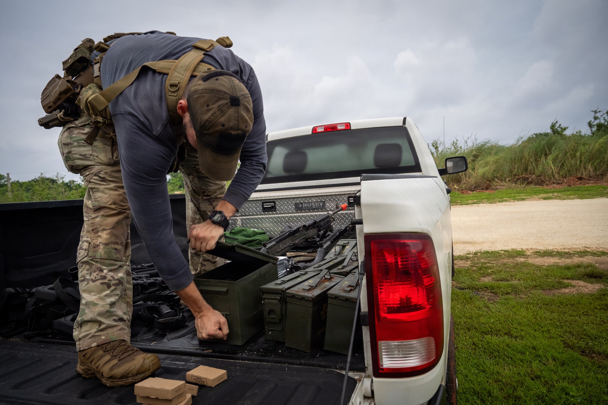 U.S. Air Force Senior Airman Dylan Gambert, 21st Combat Air Base Squadron security forces specialist, prepares equipment for opposing forces members during Pacific Defender Sustainment Training 2026 at Northwest Field, Guam, August 7, 2026. As a subordinate unit of the 21st Air Task Force, the 21st CABS provides various support capabilities that enable the ATF to generate and sustain operations in contested environments. (U.S. Air Force photo by Senior Airman Adrien Tran)