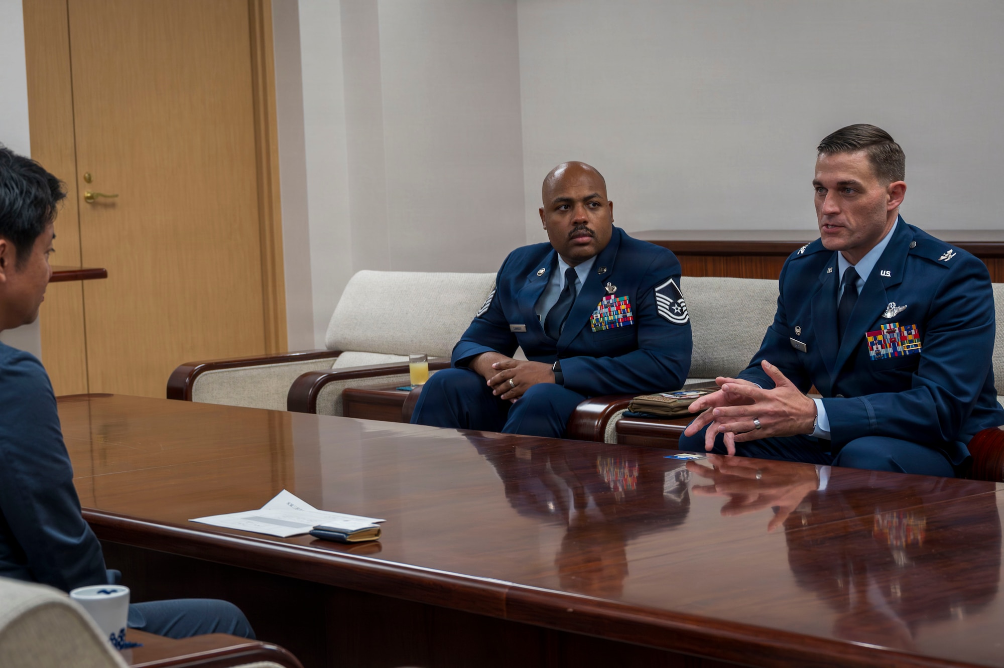 U.S. Air Force Col. Oliver Lause, 35th Fighter Wing commander, right, speaks with Aomori Prefecture Gov. Sōichirō Miyashita during an introductory office call in Aomori City, Japan, Aug. 19, 2026.
