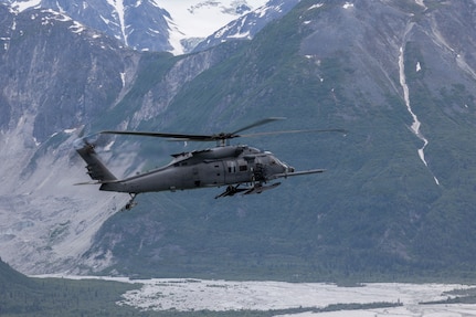 A U.S. Air Force HH-60W Jolly Green II assigned to the 210th Rescue Squadron, 176th Wing, Alaska Air National Guard, flies over Southcentral Alaska.