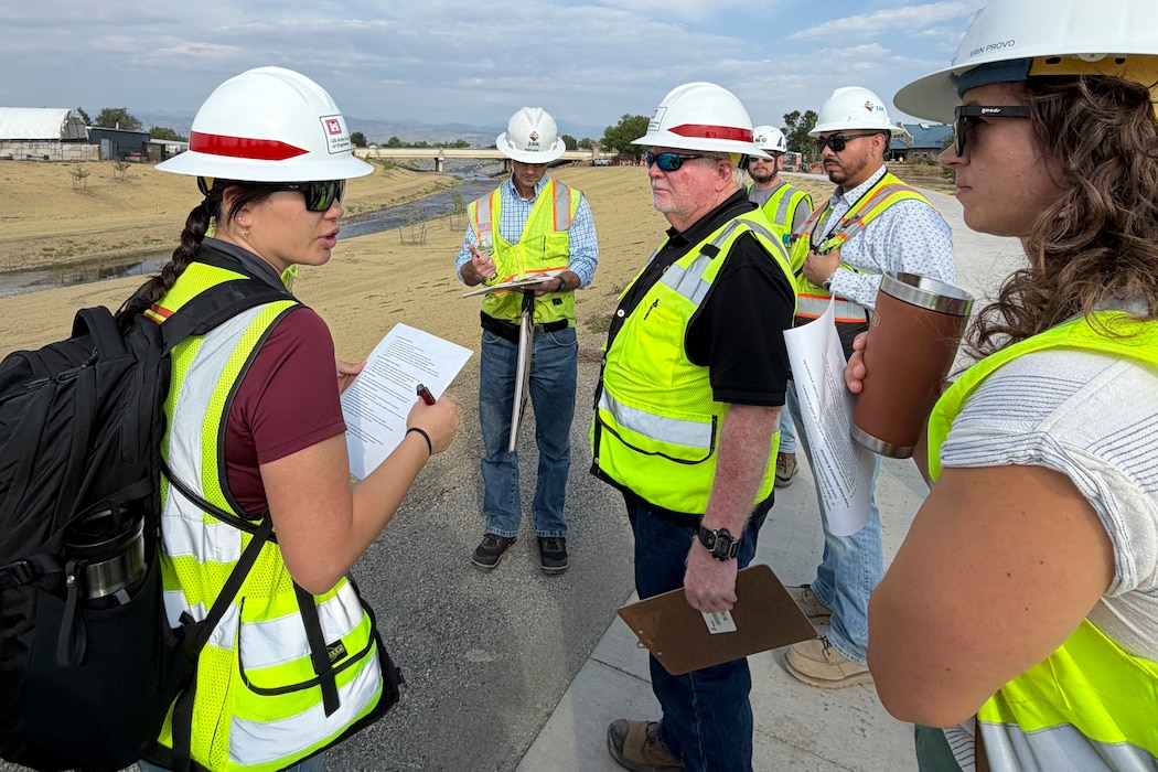Members of the U.S. Army Corps of Engineers, Omaha District, the City of Longmont and the Colorado Department of Natural Resources conduct a final walk-through of the substantially complete St. Vrain Creek flood risk reduction project along with construction contract project personnel.