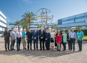 Participants in Space Systems Command’s Product Support Managers Forum pose in front of the command’s Armillary Sphere at Los Angeles Air Force Base on Aug. 6, 2026. The forum brought together SSC’s product support managers and S4 (Installations, Logistics and Product Support) directorate officials as well as members of NASA’s Logistics Management Division to discuss current efforts and issues, and foster collaboration. (Space Force Photo by Van De Ha)
