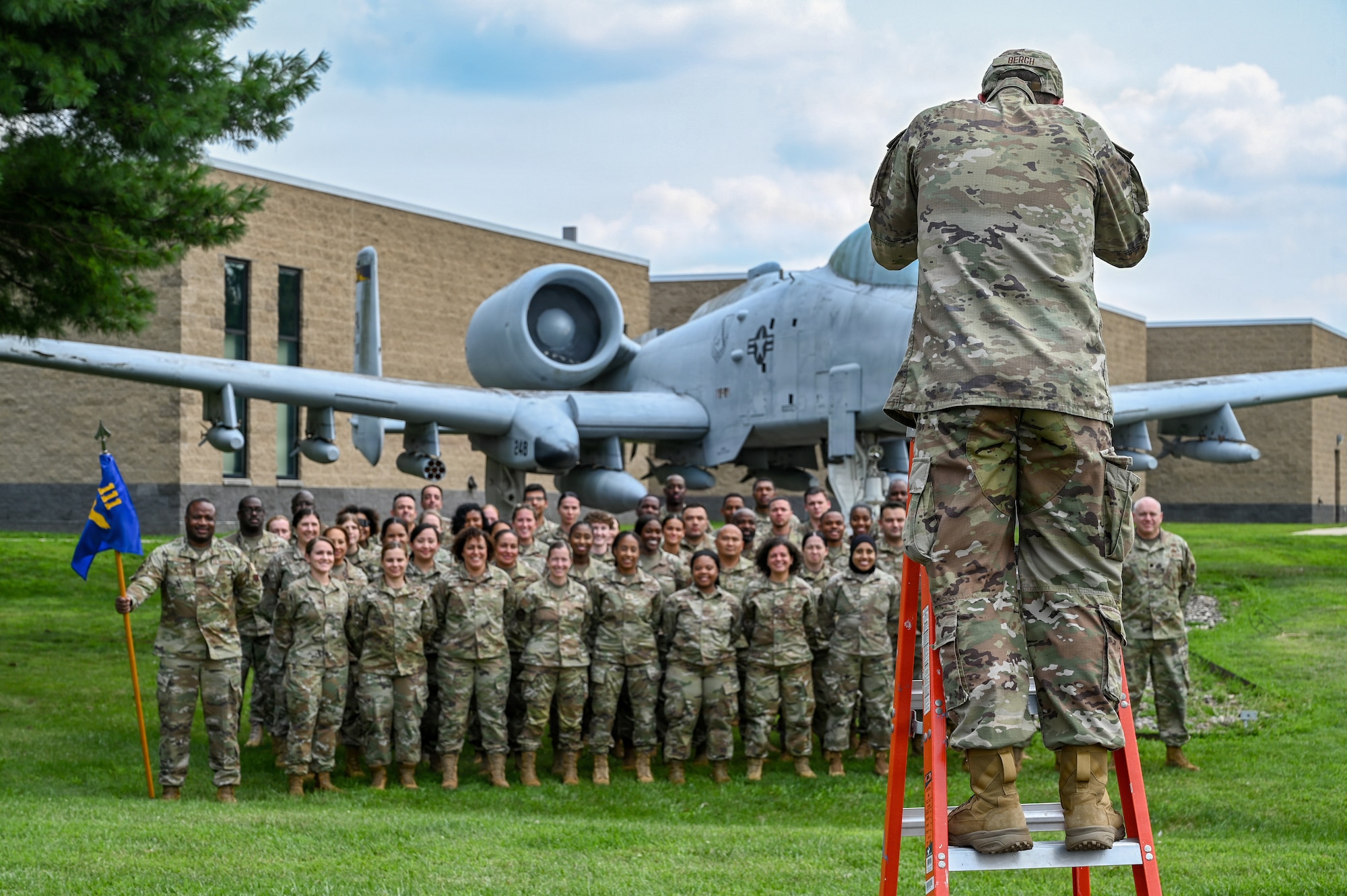 Pennsylvania Air National Guard Senior Airman Matthew Bergh, Mass Communications specialist from the 111th Attack Wing Public Affairs, takes a photo of Force Support Squadron members assigned to the 111th Attack Wing, Pennsylvania Air National Guard, and  the 149th Fighter Wing, Texas Air National Guard, during a joint training at Biddle Air National Guard Base, Horsham, Pennsylvania, Aug. 13, 2026. The purpose of this training is to complete training required every 24 months,  to ensure deployment readiness (Pennsylvania Air National Guard photo by Staff Sgt. Charles Casner)