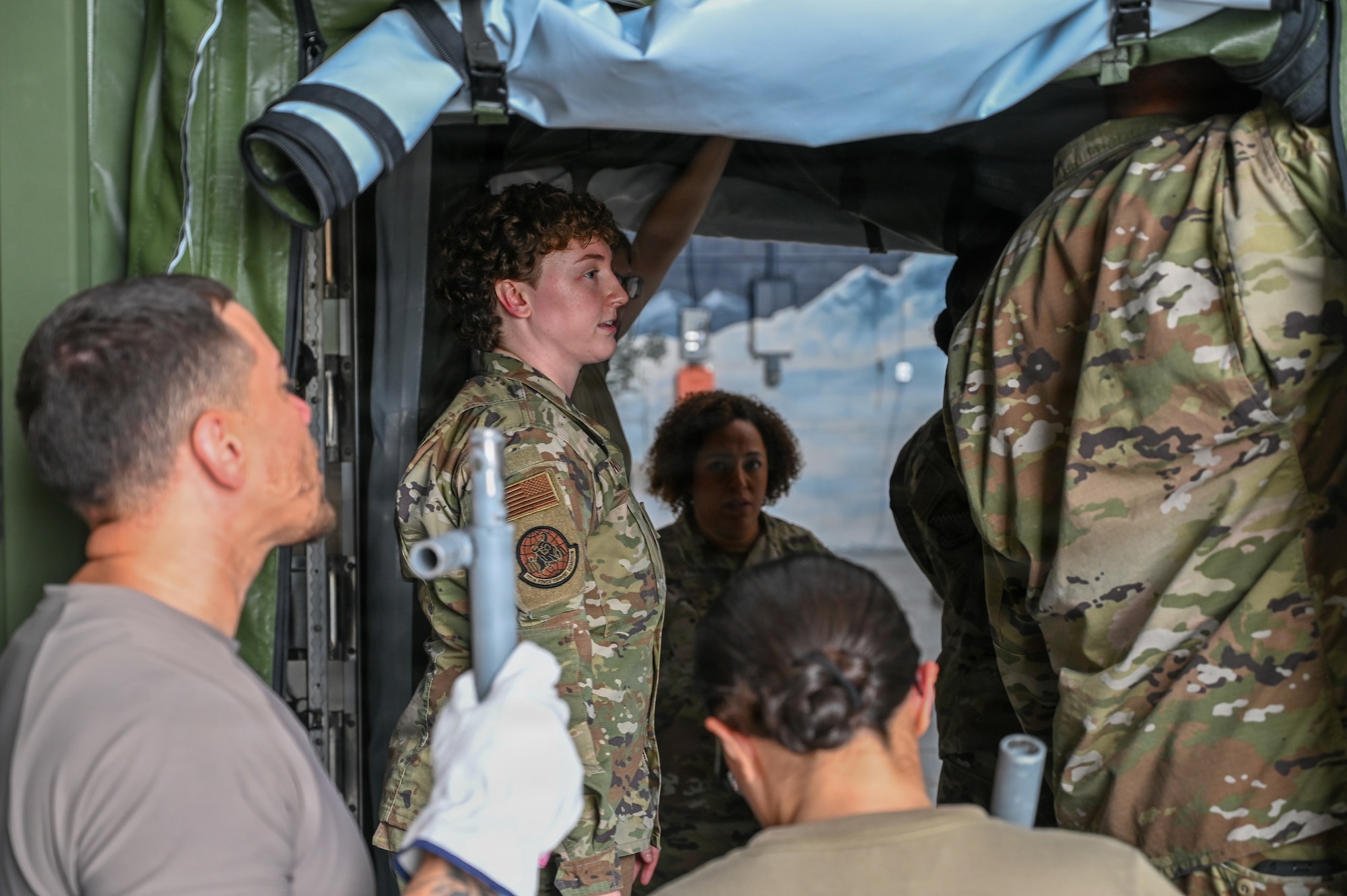 Pennsylvania Air National Guardsman Staff Sgt. Corissa Mundy, assigned to the 111th Force Support Squadron (FSS), instructs Force Support Squadron members assigned to the 111th Attack Wing, Pennsylvania Air National Guard, and the 149th Fighter Wing, Texas Air National Guard during a joint training at Biddle Air National Guard Base, Horsham, Pennsylvania, Aug. 17, 2026. The purpose of this training was to complete training required every 24 months, to ensure deployment readiness, and to work together with other wings. (Pennsylvania Air National Guard photo by Staff Sgt. Charles Casner)