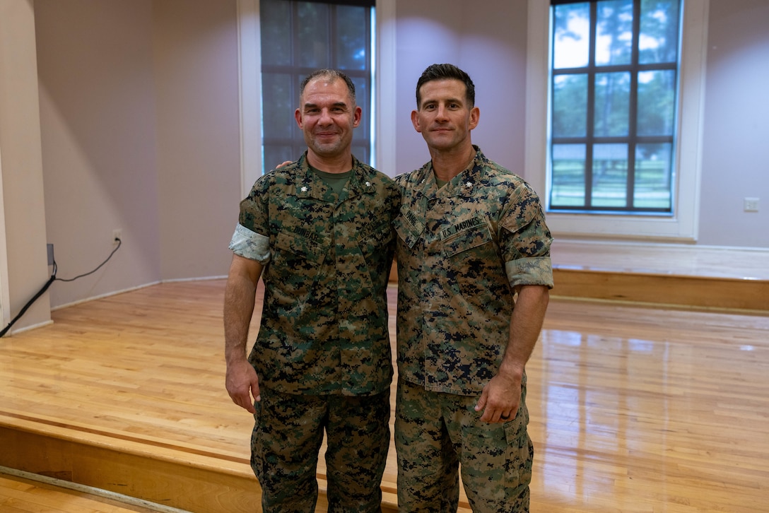 U.S. Marine Corps Lt. Col Dennis A. Dunbar, left, incoming commanding officer of 3rd Battalion, 6th Marine Regiment, 2nd Marine Division, poses for a photo with Lt. Col. Mark P. Paige, outgoing commanding officer of 3rd Battalion, 6th Marine Regiment, 2nd Marine Division, during a change of command ceremony at Marine Corps Base Camp Lejeune, North Carolina, Aug. 14, 2026. During the ceremony, Lt. Col. Mark P. Paige formally transferred command of the 3rd Battalion, 6th Marine Regiment, to Lt. Col. Dennis A. Dunbar. (U.S. Marine Corps photo by Lance Cpl. Preston Morris)