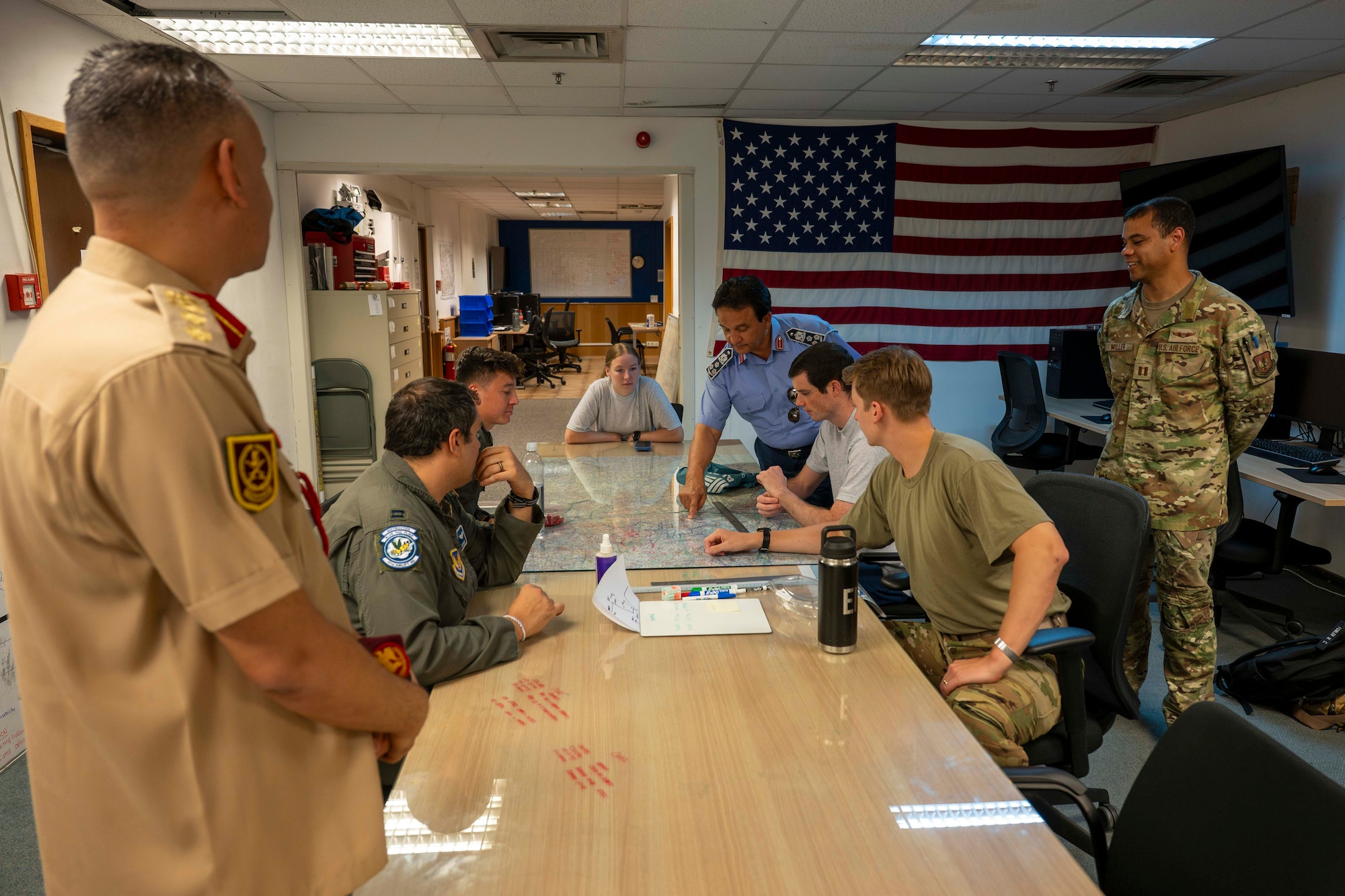 a group of people in a conference room